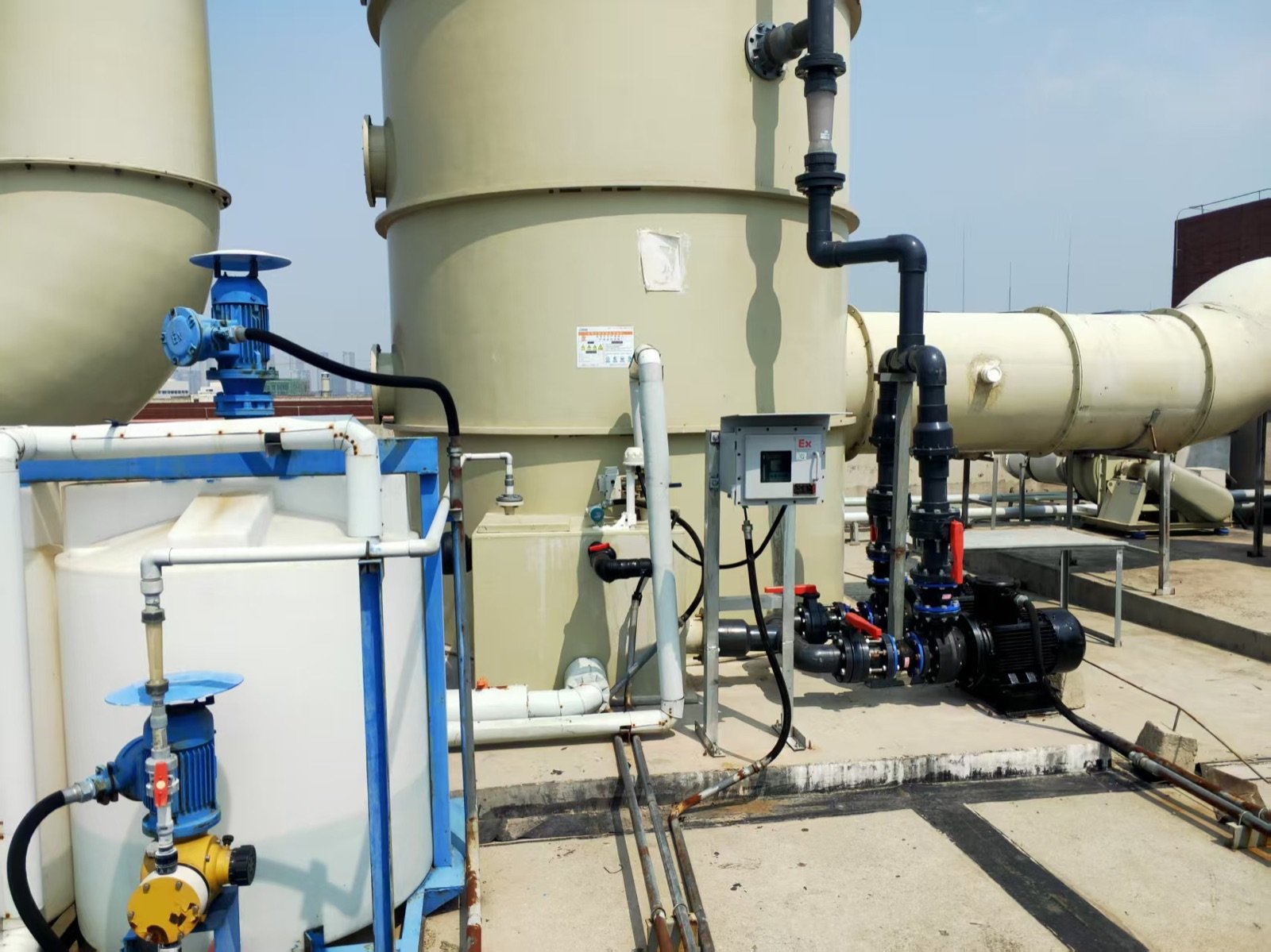Industrial acid-mist scrubber and chemical dosing equipment at an electroplating site